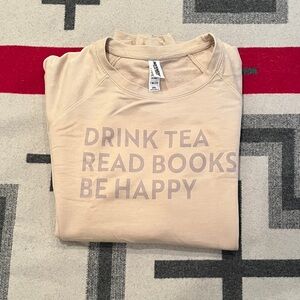 Beige Sweatshirt with words to live by! perfect for any book lover!